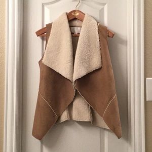 100% polyester faux suede vest with Sherpa lining